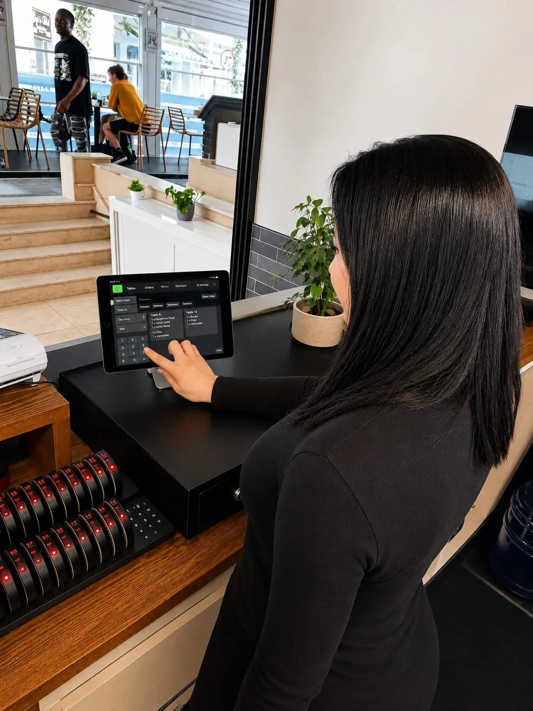 The Peking POS terminal in the restaurant, staff-facing screen showing the custom point-of-sale interface built on the same engine as the website and kiosk.