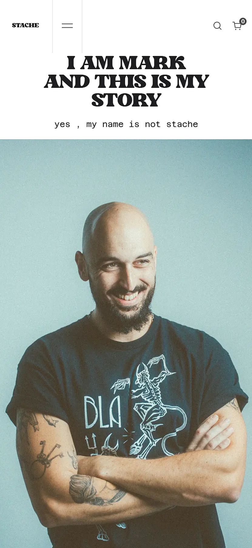 The opening of the Stache Studios about page on mobile. A headline reads I AM MARK AND THIS IS MY STORY, with a tagline yes, my name is not stache beneath it. Below the headline, a portrait of Mark himself, smiling, arms crossed, wearing one of his own printed t-shirts.