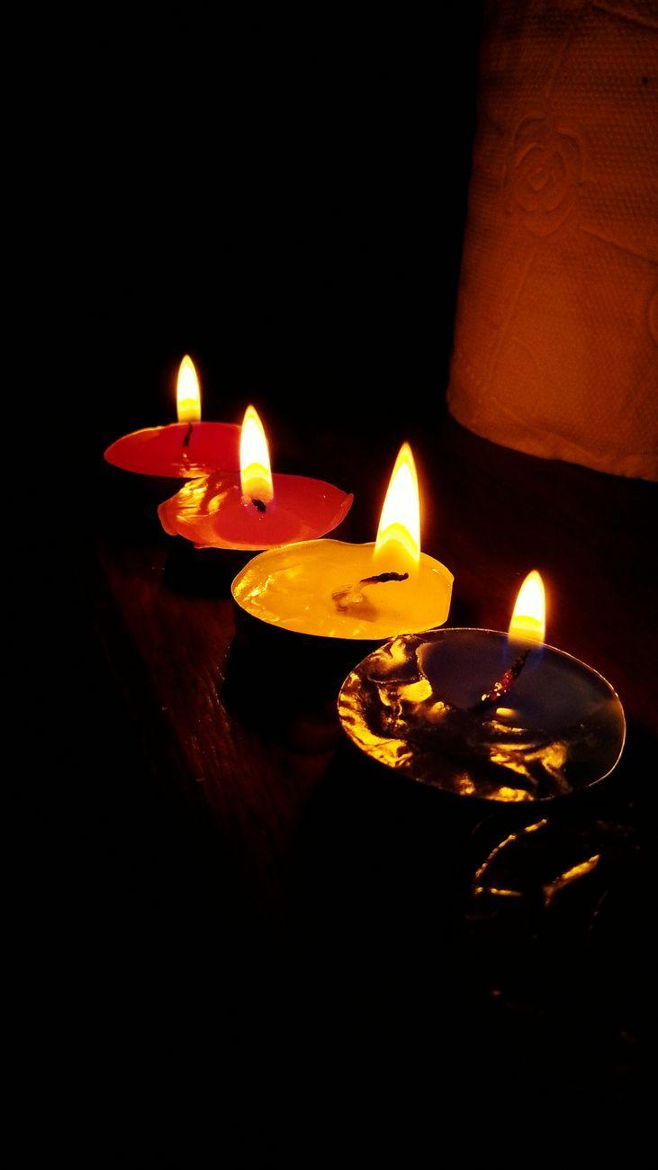 A row of warm candles in the members' lounge