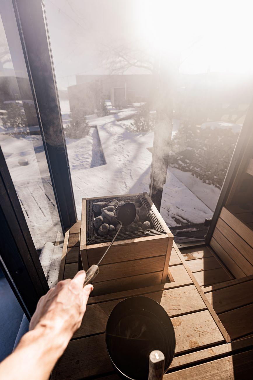 Steam rising by the sauna window