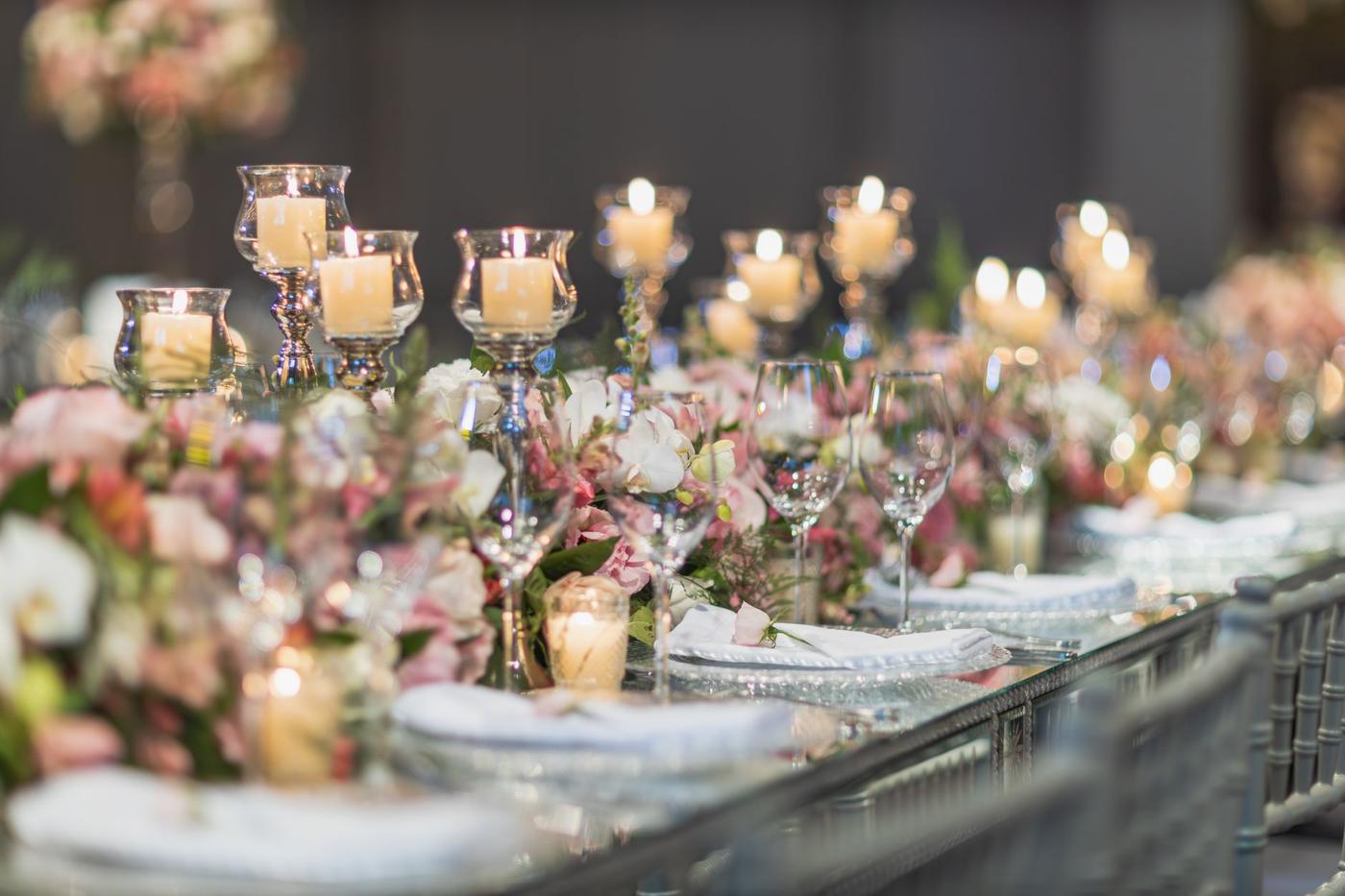 A long dinner table dressed for an event